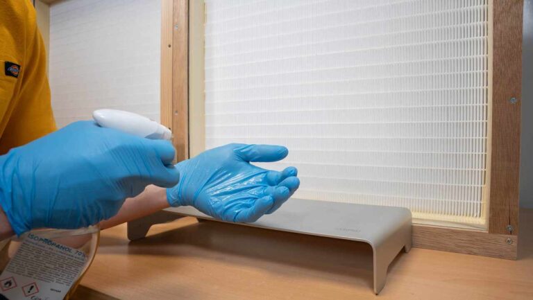 hand disinfection for grain‑to‑grain transfer